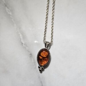 Elegant Silver and Amber Pendant Necklace